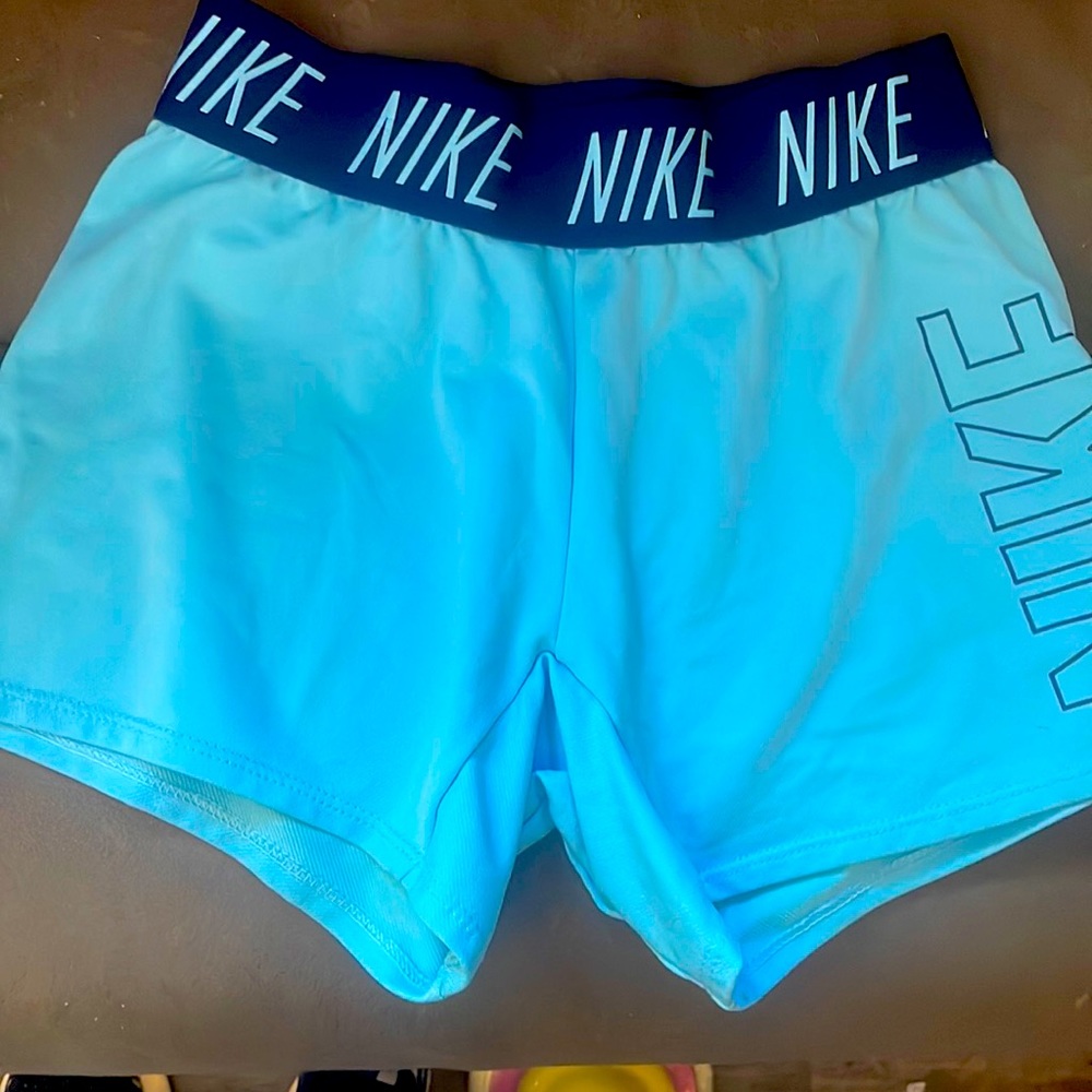 Blue Nike shorts